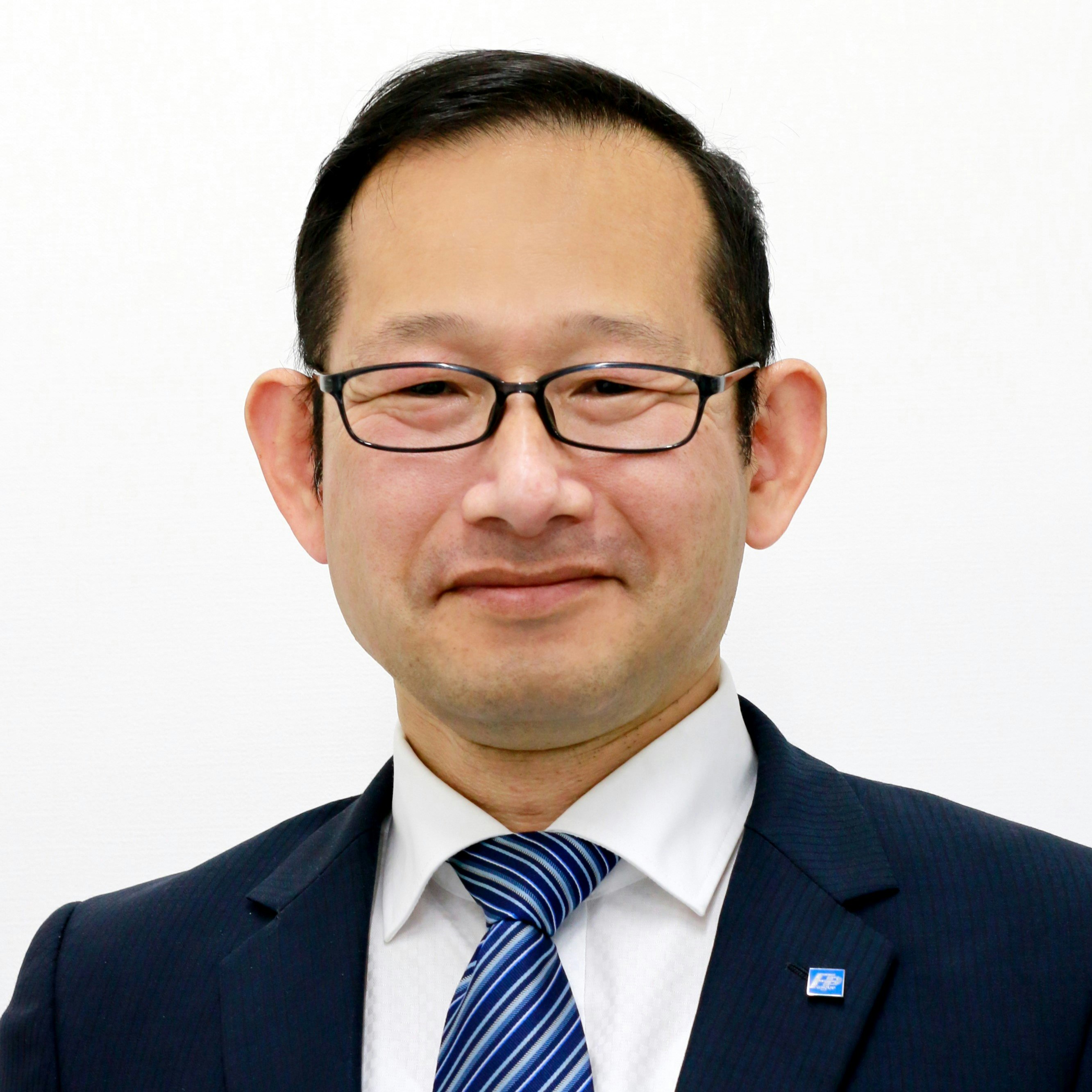 中尾 謙治